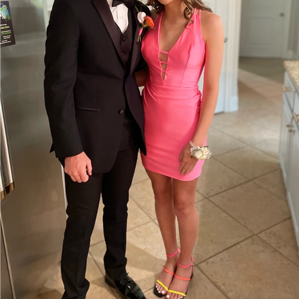 Jessica Angel coral XS formal dress cut short. Ties in back. Fun, modern look.